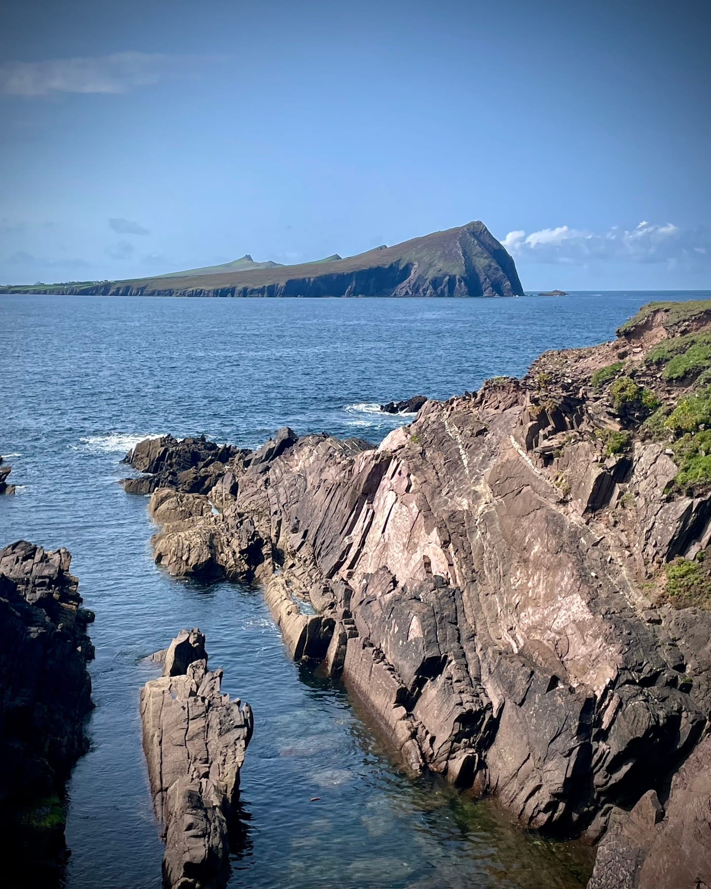 The Dingle headlands receding along the coast
