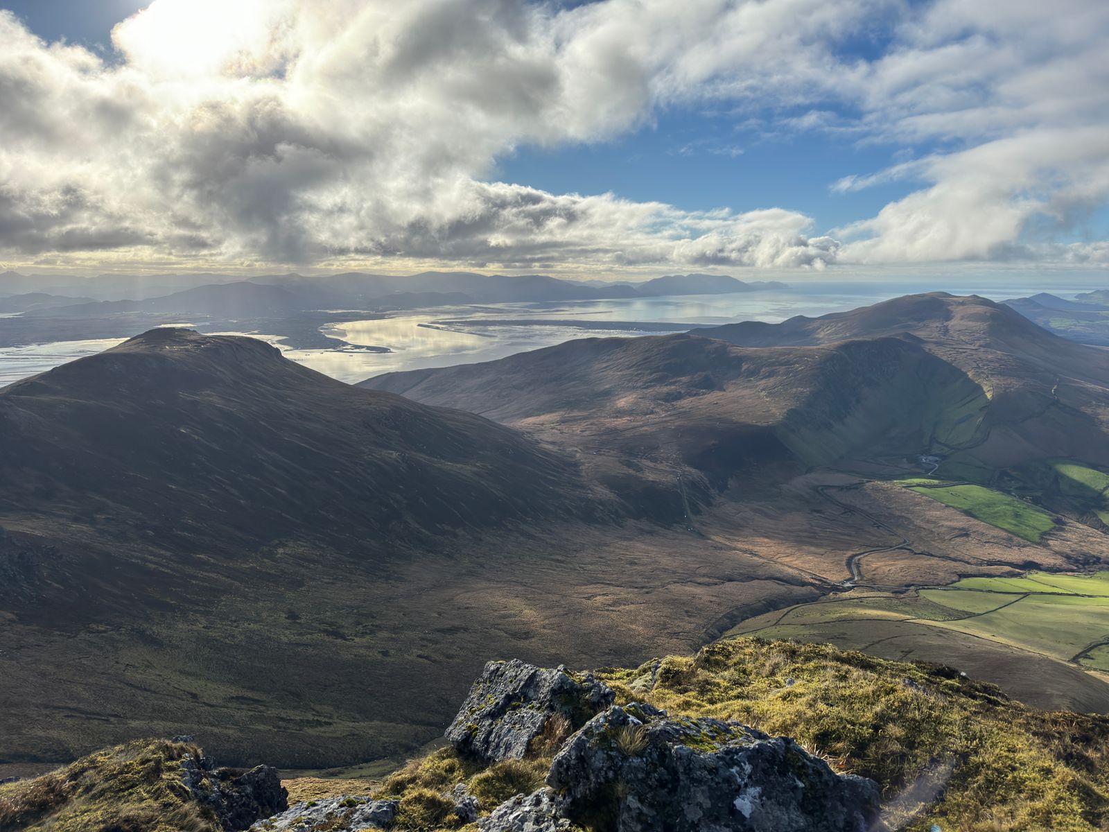 A broad view across the Slieve Mish ridges to Castlemaine Harbour