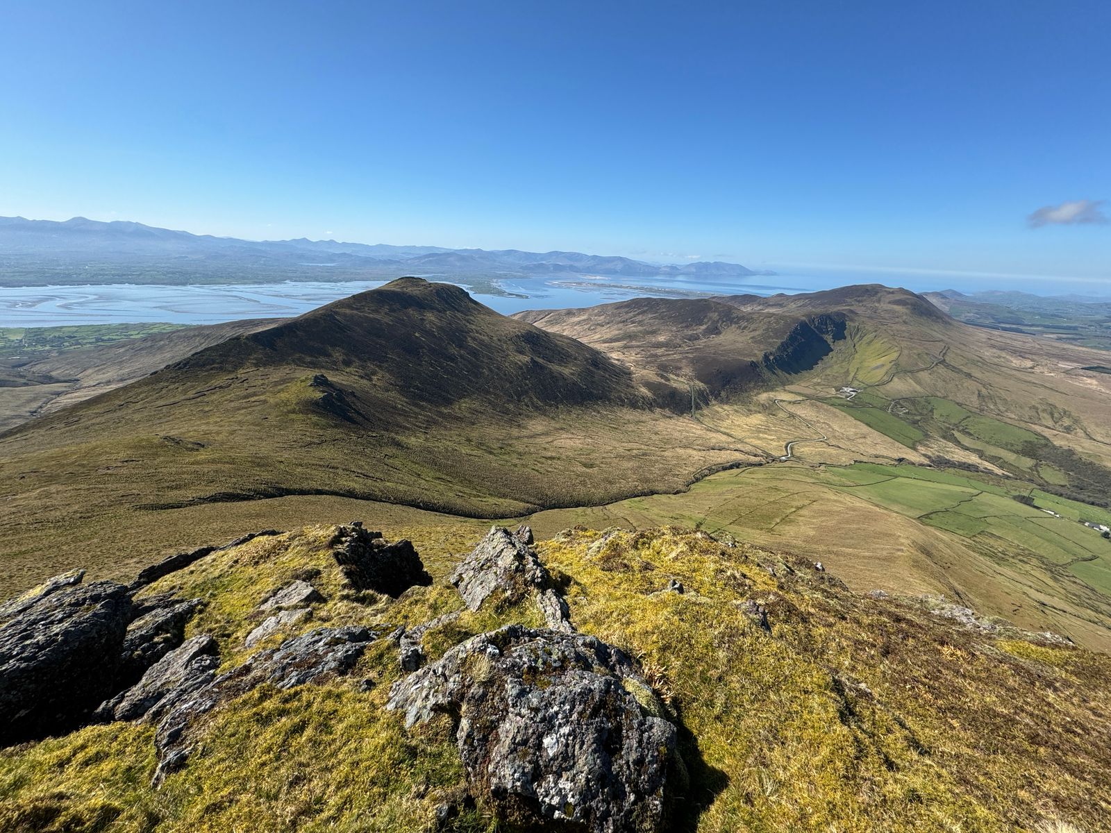 The descending ridge above Doire Mór with the harbour and coast beyond