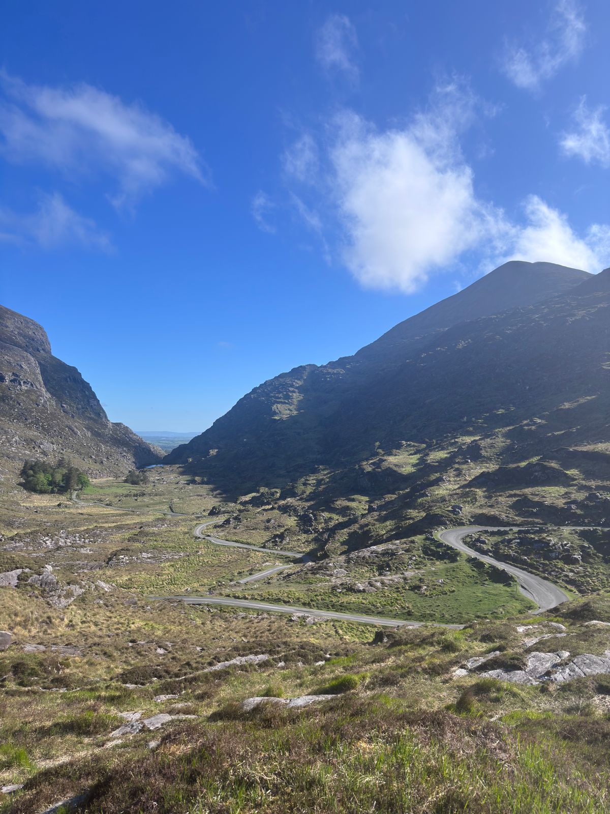 A mountain rising above the rocky approach from the Gap of Dunloe