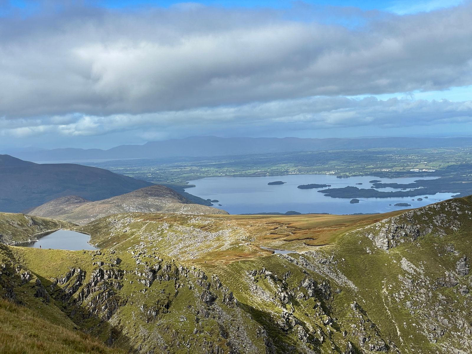 Rough mountain ridges and a small tarn above the Killarney lakes