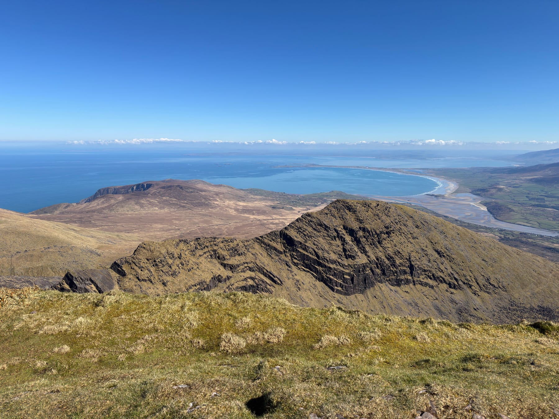 Rocky corrie descending towards a broad Atlantic bay